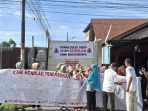 Gelar Aksi Tanda Tangan Kain Putih 5 Meter, Warga Gang Anggrek Tuntut Wali Kota Medan Copot Camat, Lurah, dan Kepling IV